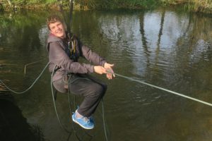 smiling on a zip line