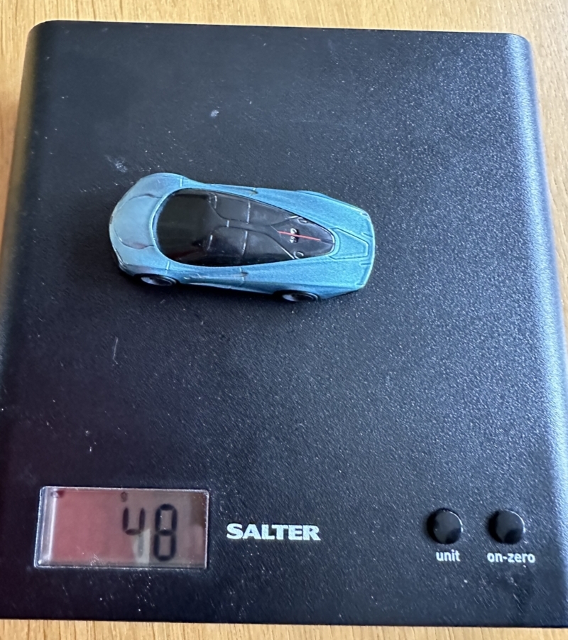 blue car on the scales - weighs 48g